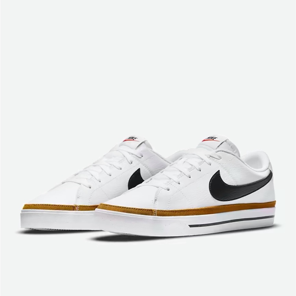 Nike White Sneakers with Black Swoosh and Gold Trim